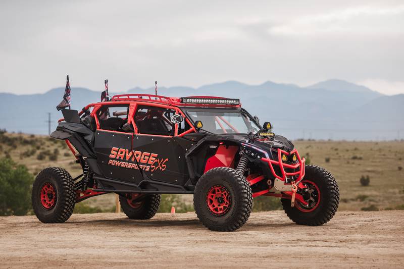 The red and black Savage Powersports build at Peak Adrenaline