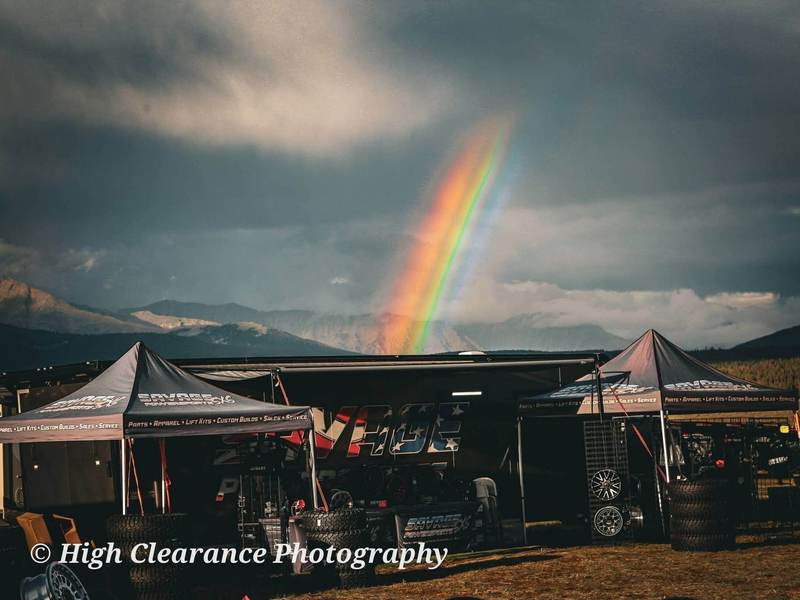A rainbow over the Savage trailer and tents at Taylor Park