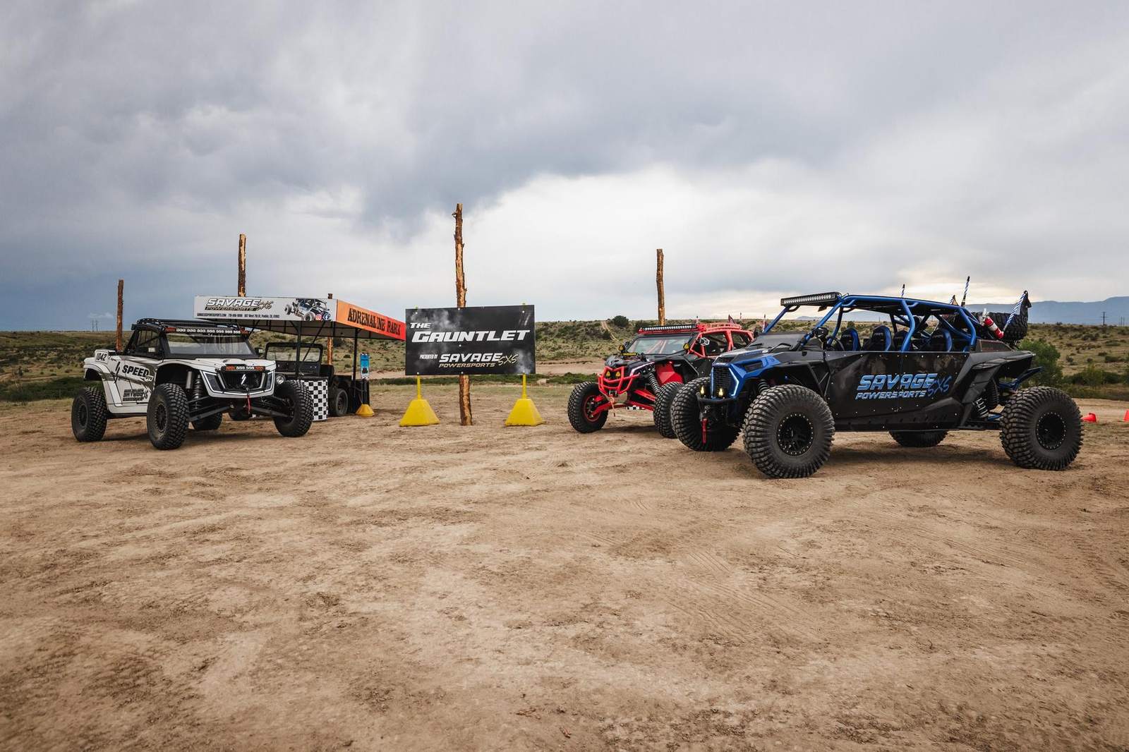 Savage Powersports machines lined up at The Gauntlet