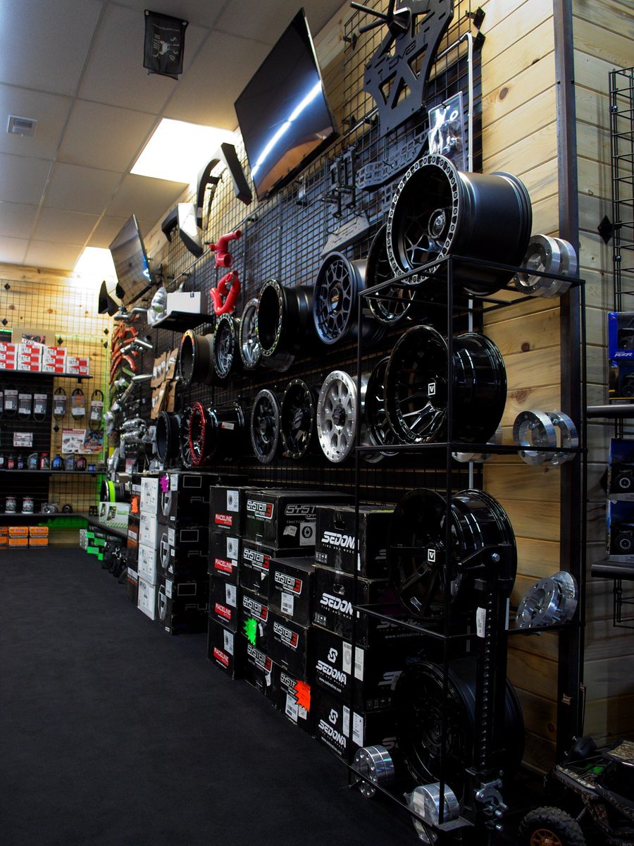 Wheels and tires on the wall at Savage Powersports